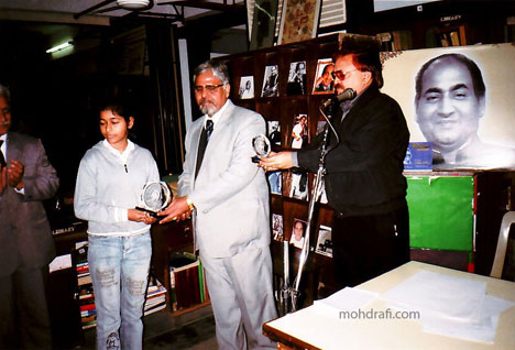 Painting Competition prize distribution at Bhartiya Vidya Bhavan  Mr.Naresh Sharma and Triloknath from the Rafi Foundation