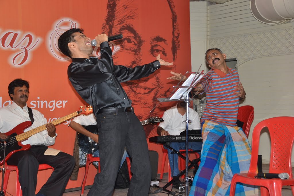 IFRM member Mouli re-enacting the song 'hum kaale hai toh kya hua dil waale hai'. Singer is Aniket