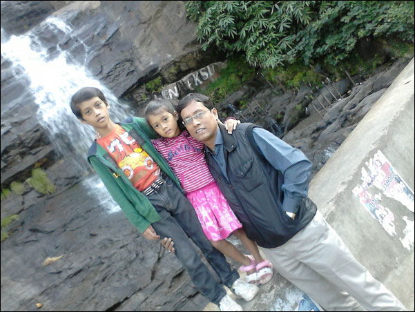 Author Biman Baruah with son and daughter