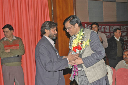 Vinod Viplav (left) welcomes Mukesh Garg