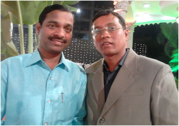 Author Mr. Biman Baruah with a friend